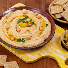 Healthy Homemade Hummus Dip with Olive Oil. Selective focus.