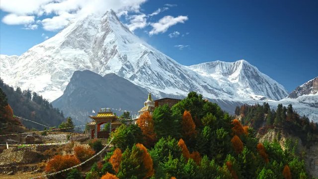 Himalayas mountain landscape. Buddhist monastery and Manaslu mount in Himalayas, Nepal. Timelapse.
