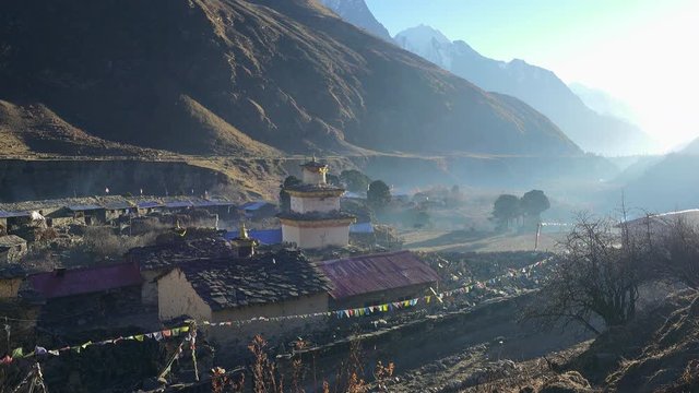 Sunrise view of traditional Nepali village in high hymalaya mountains. Manaslu circuit 
