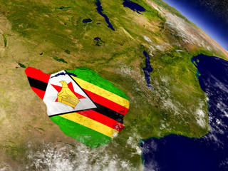 Zimbabwe with embedded flag on Earth