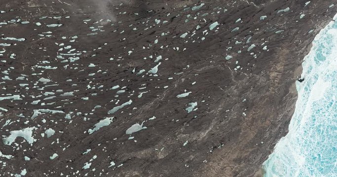 High-altitude overflight aerial of glacial ice in Drumlin Field, Nunavut Territory of Canada. Clip loops and is reversible. Elements of this image furnished by USGS/NASA Landsat 

