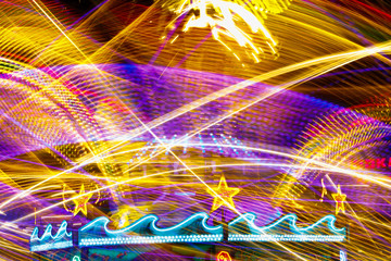 Blurred bokeh light in amusement park