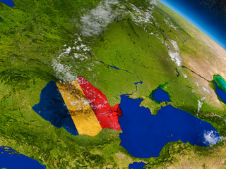 Romania with embedded flag on Earth