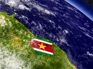 Suriname with embedded flag on Earth