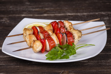 Tasty grilled meat and vegetables on skewer