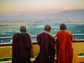 Traditonal, unrecognizable buddhist monks in Myanmar