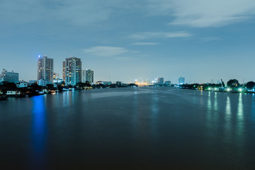 Fototapeta na wymiar Night cityscape of River in Bangkok city, thailand.