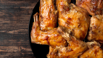 The rabbit baked in an oven in red sauce