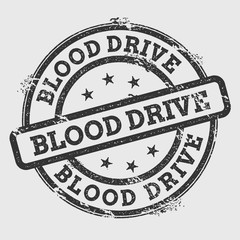 Blood drive rubber stamp isolated on white background. Grunge round seal with text, ink texture and splatter and blots, vector illustration.