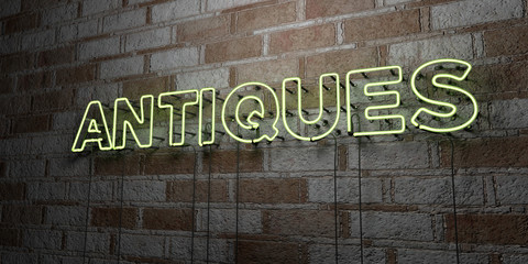ANTIQUES - Glowing Neon Sign on stonework wall - 3D rendered royalty free stock illustration.  Can be used for online banner ads and direct mailers..