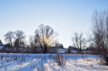 Fototapeta na wymiar a sunny day in winter village