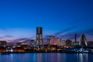 Fototapeta na wymiar Yokohama Minato Mirai 21 seaside urban area in Japan at dusk