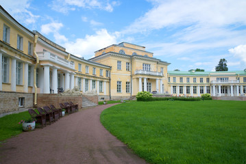 Obraz premium Central part of an ancient noble mansion in the cloudy July afternoon. Leningrad region