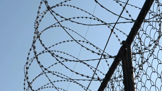 Fence in the prison of power of detention. Inner classic prison landscape. Russia 