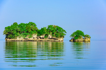 Ocean island of blue water
