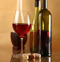 wine bottle and  glass on a  table