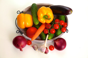 Composition with assorted raw organic vegetables on table