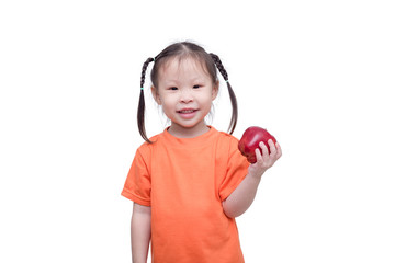 Little asian girl holding an apple over white