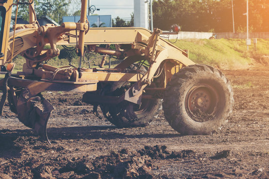 Grader Leveling Landfill On Construction Site Before Kick Off Project