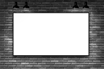 Blank frame on brick wall with lamp. nice show room with spotlights. 