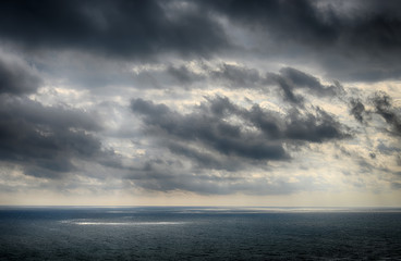 Naklejka na ściany i meble Beautiful sky over the sea after the storm. High Dynamic Range photo