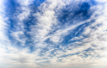 Naklejka na ściany i meble Bright blue sky with cumulus white clouds. HDR photo