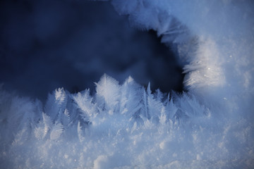 Winter background. Snow flakes frozen pattern