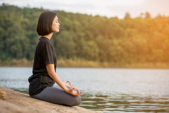 Asian Woman Yoga Relax In Nature To Relax Outdoor