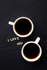The inscription I love you, two cups of coffee. Surprise for a loved one.