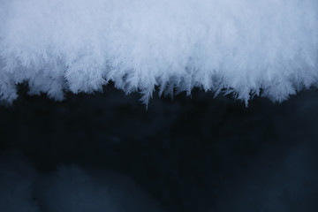 Winter blue background -frozen snowflakes