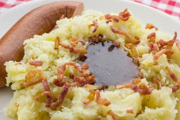 Typical dutch dish zuurkool with sauerkraut, smoked sausage and