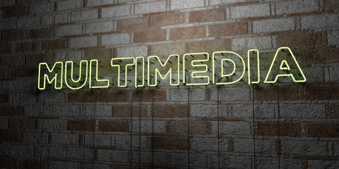 MULTIMEDIA - Glowing Neon Sign on stonework wall - 3D rendered royalty free stock illustration.  Can be used for online banner ads and direct mailers..