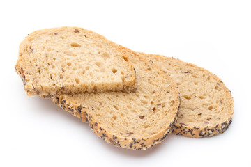 White bread sliced wholegrain bread on a wooden table.