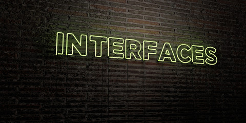 INTERFACES -Realistic Neon Sign on Brick Wall background - 3D rendered royalty free stock image. Can be used for online banner ads and direct mailers..