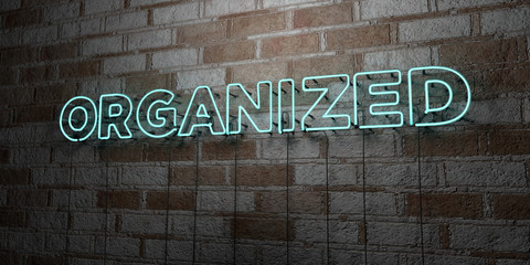 ORGANIZED - Glowing Neon Sign on stonework wall - 3D rendered royalty free stock illustration.  Can be used for online banner ads and direct mailers..