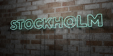 STOCKHOLM - Glowing Neon Sign on stonework wall - 3D rendered royalty free stock illustration.  Can be used for online banner ads and direct mailers..