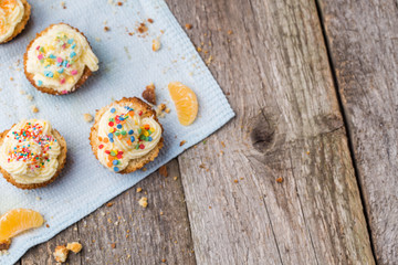 Cupcakes with white frosting and sprinkles