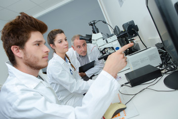 group of young apprentices at a lab