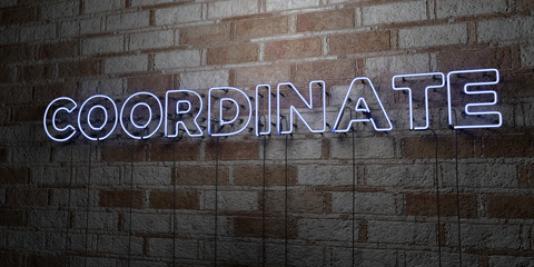 COORDINATE - Glowing Neon Sign on stonework wall - 3D rendered royalty free stock illustration.  Can be used for online banner ads and direct mailers..