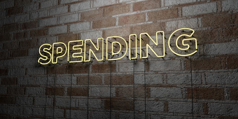 SPENDING - Glowing Neon Sign on stonework wall - 3D rendered royalty free stock illustration.  Can be used for online banner ads and direct mailers..