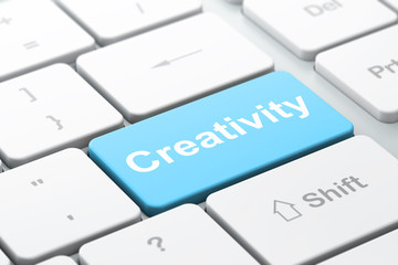 Advertising concept: Creativity on computer keyboard background