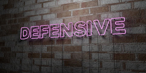 DEFENSIVE - Glowing Neon Sign on stonework wall - 3D rendered royalty free stock illustration.  Can be used for online banner ads and direct mailers..