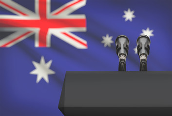 Pulpit and two microphones with a national flag on background - Australia