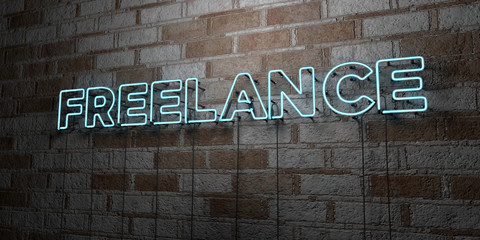 FREELANCE - Glowing Neon Sign on stonework wall - 3D rendered royalty free stock illustration.  Can be used for online banner ads and direct mailers..