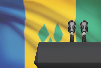 Pulpit and two microphones with a national flag on background - Saint Vincent and the Grenadines
