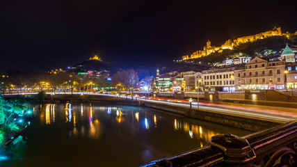 Fototapeta na wymiar Aerial night view of Old Tbilisi, Georgia with Illuminated churc