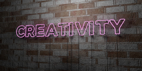 CREATIVITY - Glowing Neon Sign on stonework wall - 3D rendered royalty free stock illustration.  Can be used for online banner ads and direct mailers..