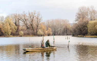 Fototapeta na wymiar Winter fishing from a boat
