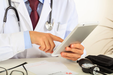 Doctor holding a tablet