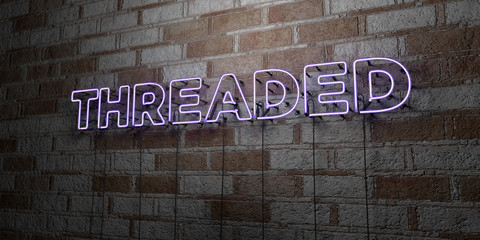 THREADED - Glowing Neon Sign on stonework wall - 3D rendered royalty free stock illustration.  Can be used for online banner ads and direct mailers..